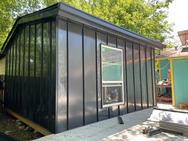 Black standing seam metal wall panels for Metal Roof Installation in West Frankfort