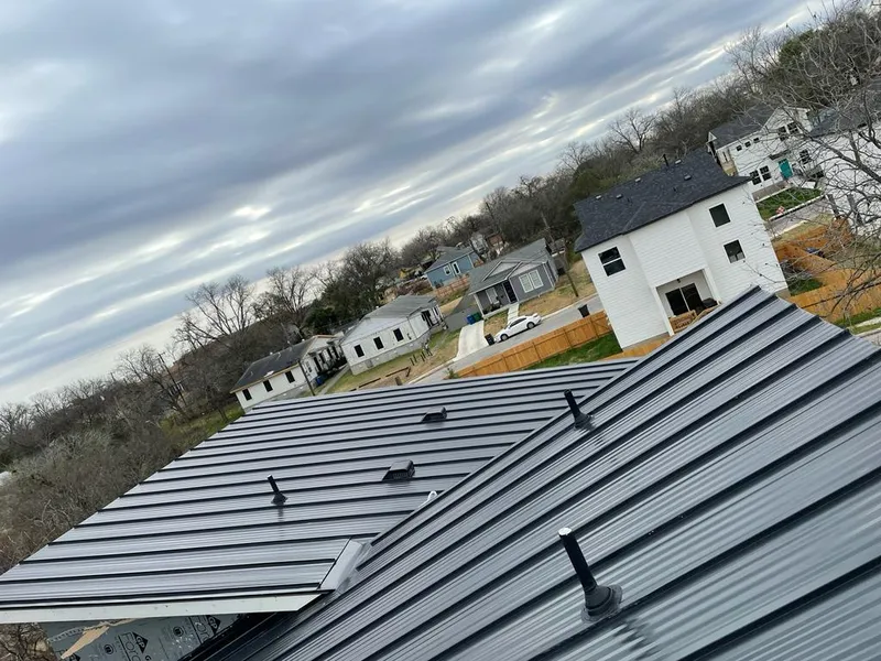 Standing seam metal roof panels with vents for Skylight Repair in West Frankfort